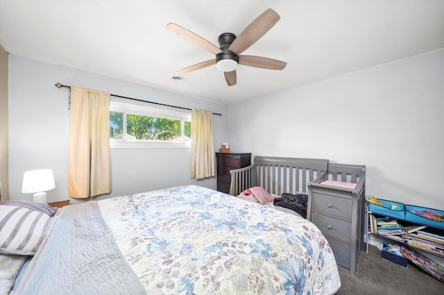 carpeted bedroom with ceiling fan