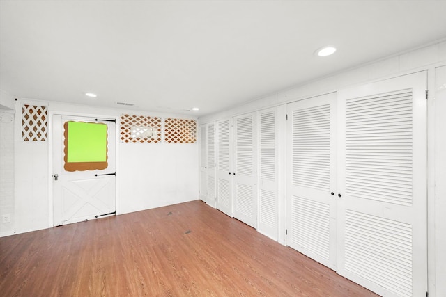 unfurnished bedroom featuring hardwood / wood-style floors