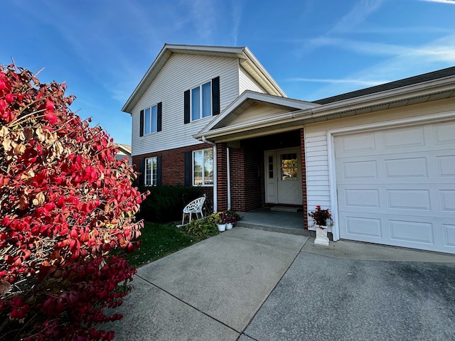 view of front of home with a garage