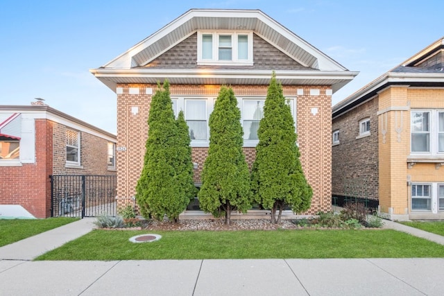 view of front facade featuring a front yard