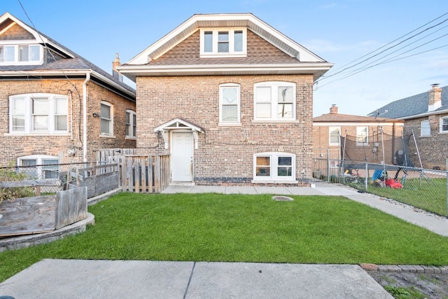 view of front of home with a front yard