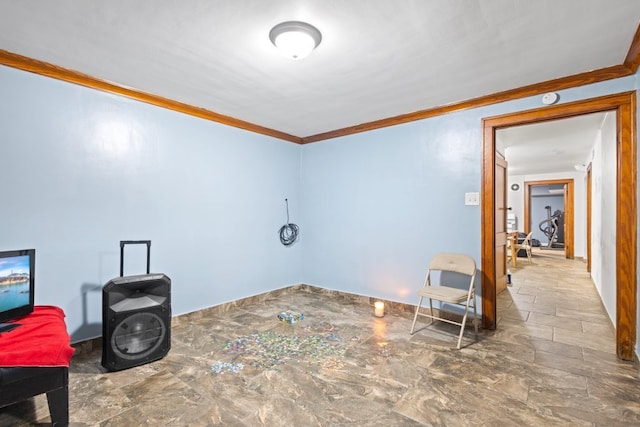 unfurnished room featuring crown molding