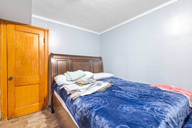 bedroom with crown molding