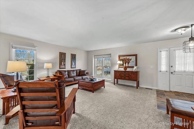 living room with french doors and carpet