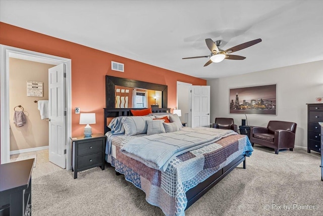 carpeted bedroom with ceiling fan