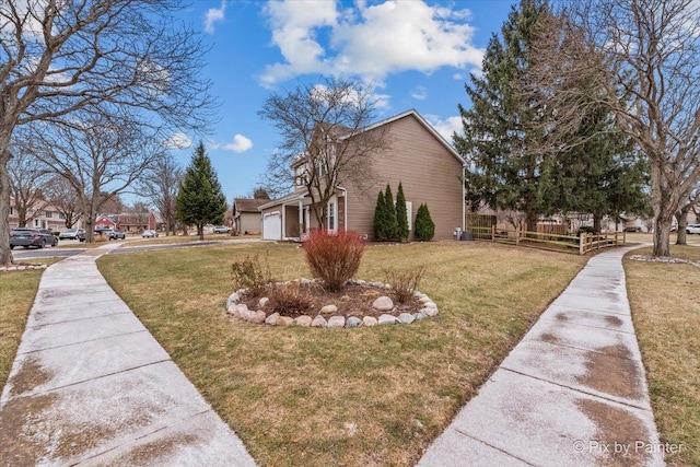 view of side of property featuring a lawn