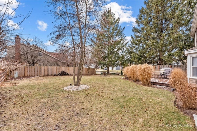 view of yard featuring a wooden deck