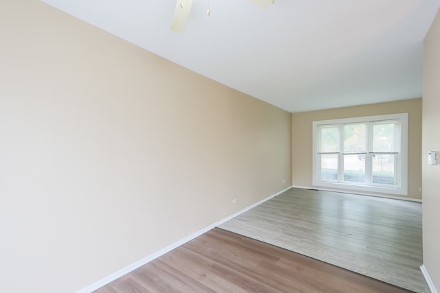 empty room with light hardwood / wood-style floors