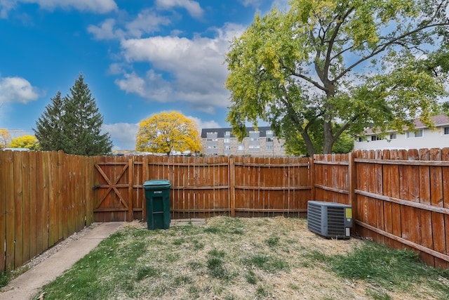 view of yard featuring central AC