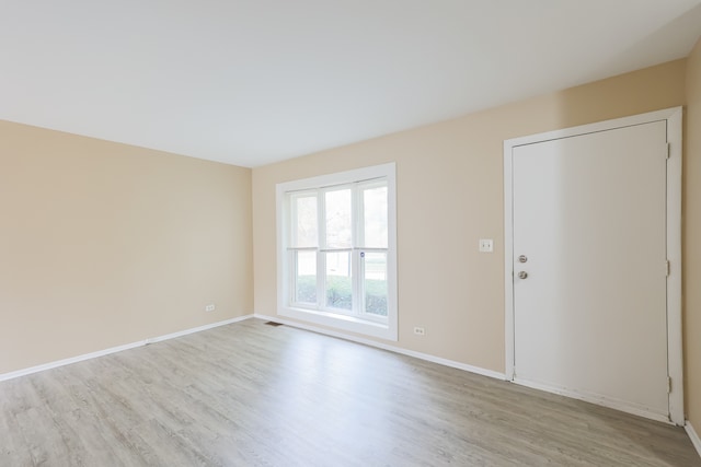 empty room featuring light hardwood / wood-style flooring