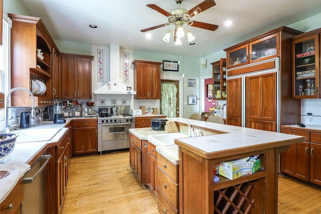 4533 Highland Ave, Downers Grove, IL 60515 - kitchen featuring open shelves, premium appliances, wall chimney exhaust hood, light wood-style flooring, and recessed lighting