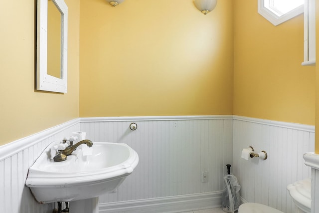 4533 Highland Ave, Downers Grove, IL 60515 - half bath featuring a wainscoted wall and toilet