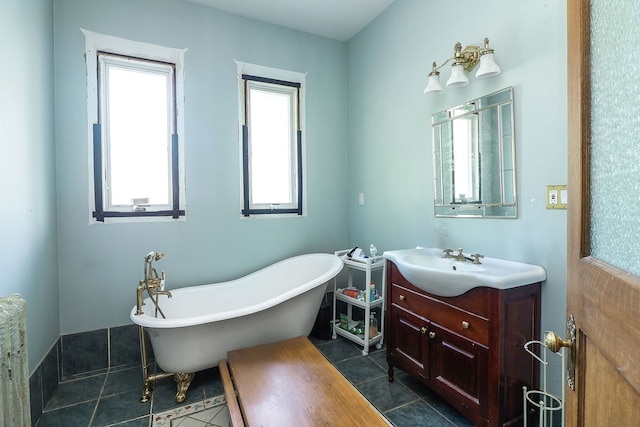4533 Highland Ave, Downers Grove, IL 60515 - full bathroom featuring vanity, a soaking tub, tile patterned floors, and radiator heating unit
