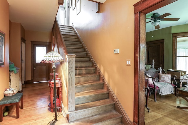 4533 Highland Ave, Downers Grove, IL 60515 - staircase featuring hardwood / wood-style floors and a ceiling fan