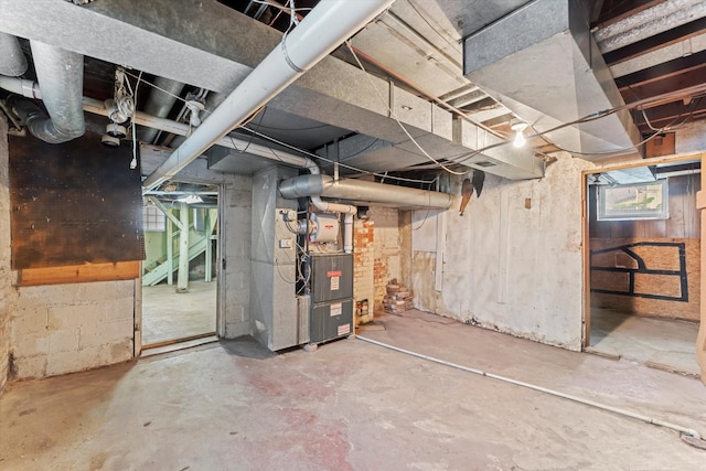 basement featuring heating unit