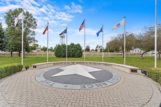 view of basketball court featuring a lawn