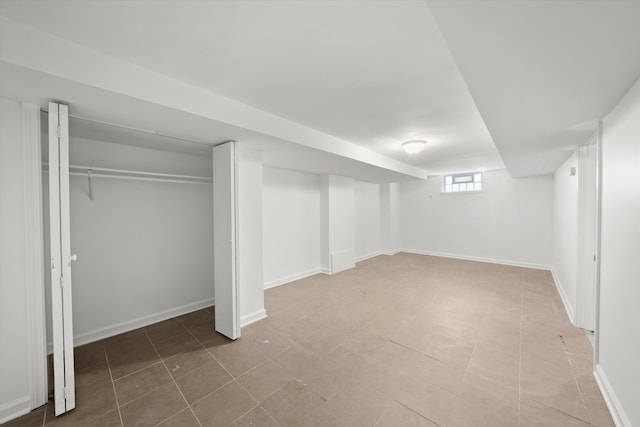 basement featuring tile patterned floors