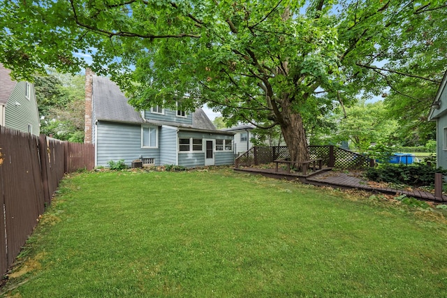 view of yard with a deck