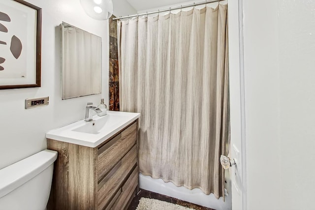 full bathroom featuring vanity, toilet, and shower / bathtub combination with curtain