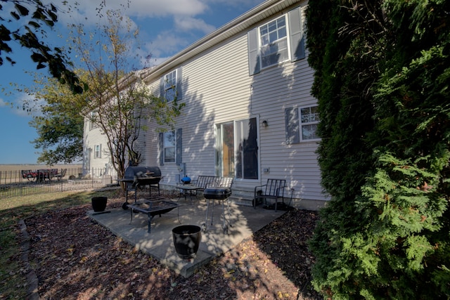 back of house featuring a patio area