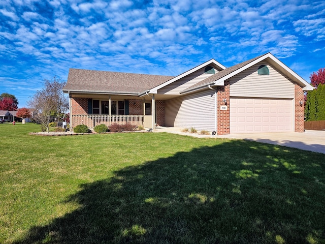 ranch-style house with a front yard, a garage, and covered porch