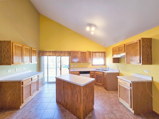 kitchen with light tile patterned floors, high vaulted ceiling, white dishwasher, sink, and a center island