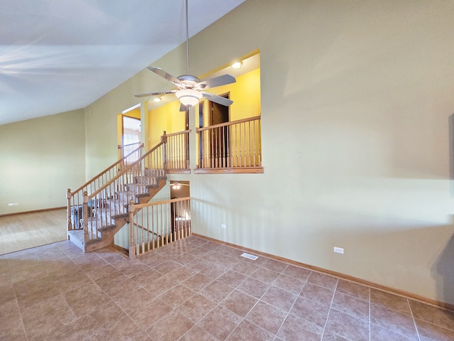 stairway with ceiling fan