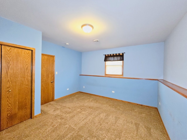 spare room with carpet