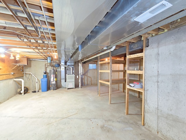 basement featuring water heater