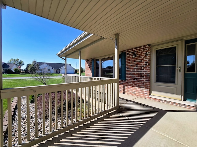 balcony featuring a porch