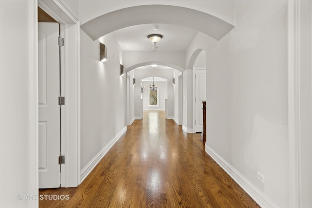 hallway featuring dark hardwood / wood-style floors