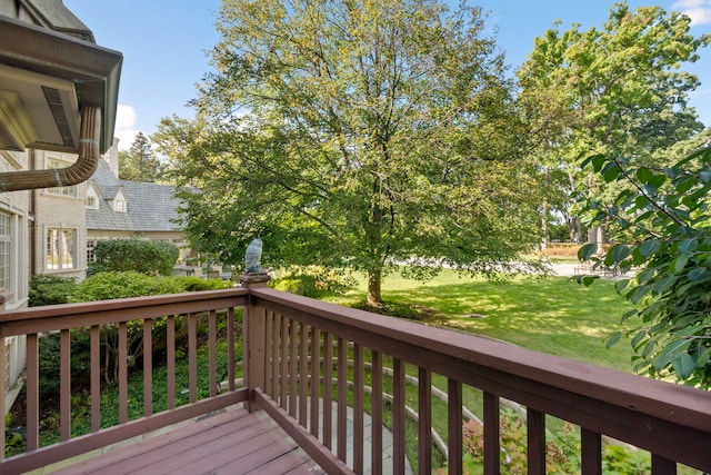 deck featuring a lawn