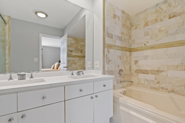 bathroom featuring vanity and shower with separate bathtub