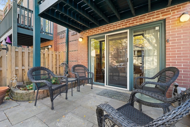 view of patio / terrace featuring a balcony