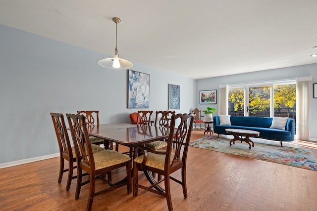 dining area featuring hardwood / wood-style flooring