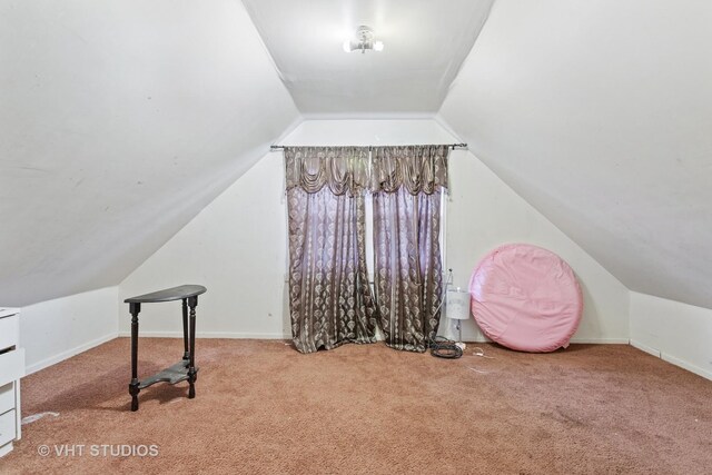 10238 S Vernon Ave, Chicago, IL 60628 - bonus room featuring carpet, vaulted ceiling, and baseboards