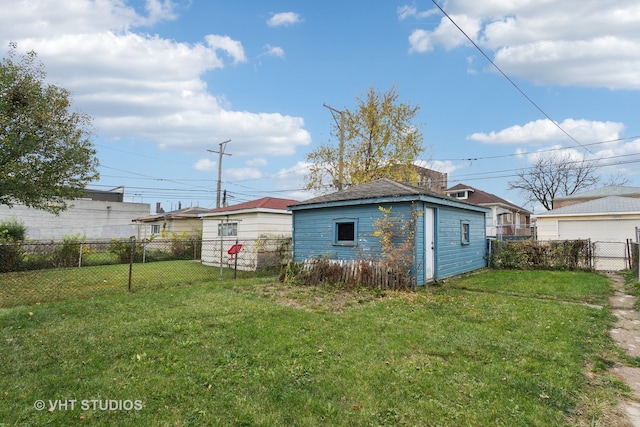 rear view of house featuring a yard