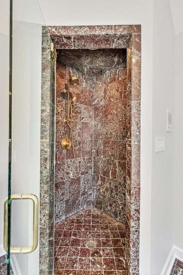 bathroom featuring an enclosed shower