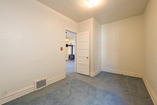 empty room featuring carpet floors