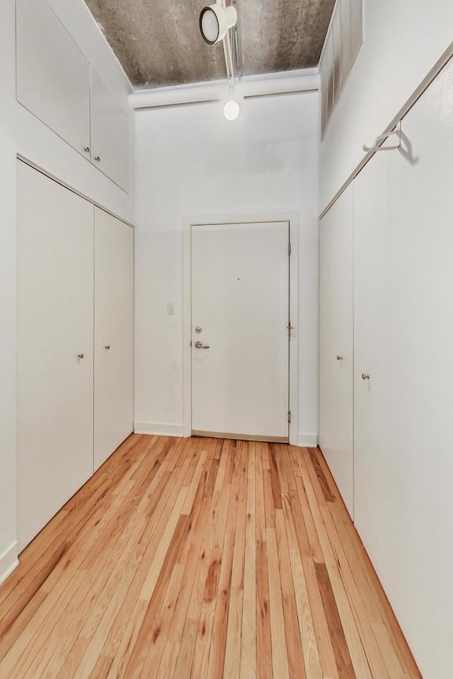 foyer with light hardwood / wood-style flooring