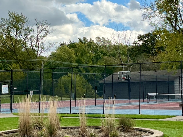 view of basketball court featuring tennis court