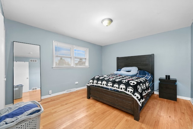 bedroom featuring wood-type flooring