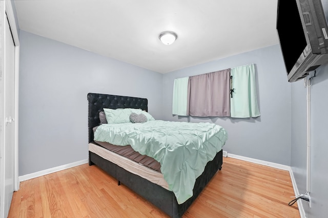 bedroom featuring hardwood / wood-style flooring