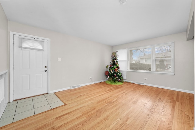 entryway with light wood-type flooring