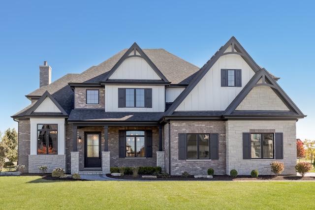 view of front of property with a front lawn