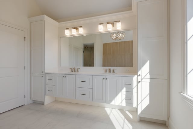 bathroom with vanity, a shower, lofted ceiling, and a chandelier