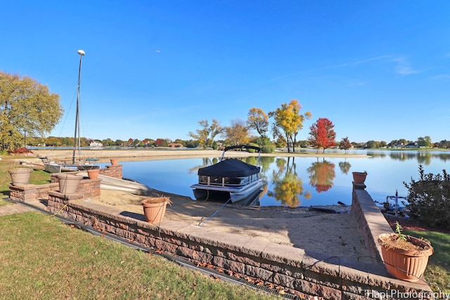 dock area featuring a water view