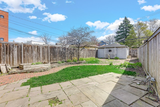 view of yard with a patio and an outdoor structure
