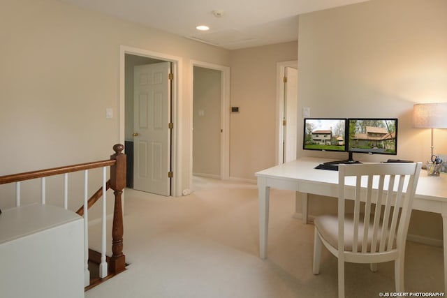 office space with light colored carpet