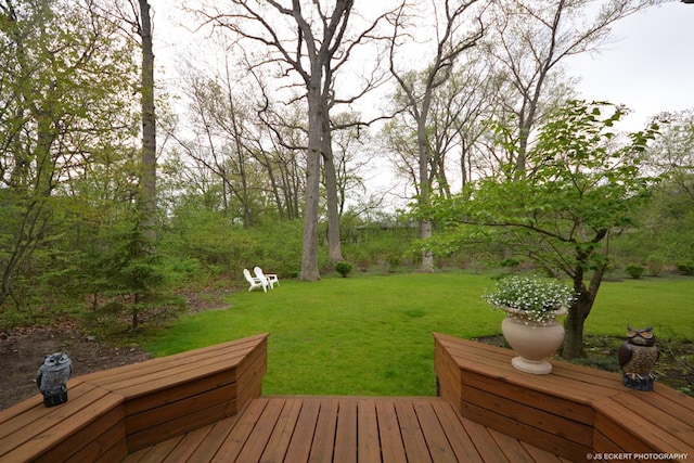 wooden deck with a yard